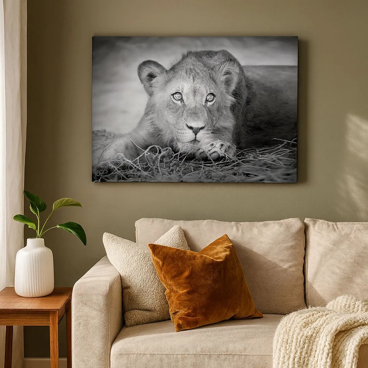 Impression sur toile - Image sur toile - Portrait monochrome d'un jeune lion couché - 70x50cm - Chiot royal - Décoration murale moderne pour le salon et la chambre ARTTOR